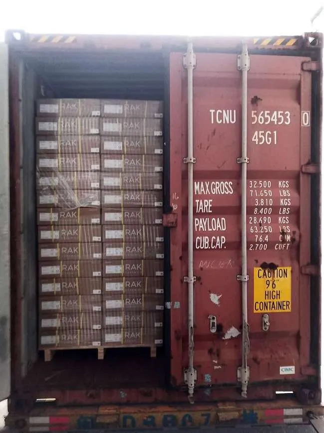 Fig 2: Consolidated cargo inside the warehouse — cisterns from different suppliers staged and matched against the container packing list